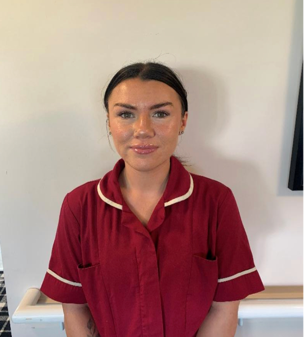 Woman in red nurses uniform