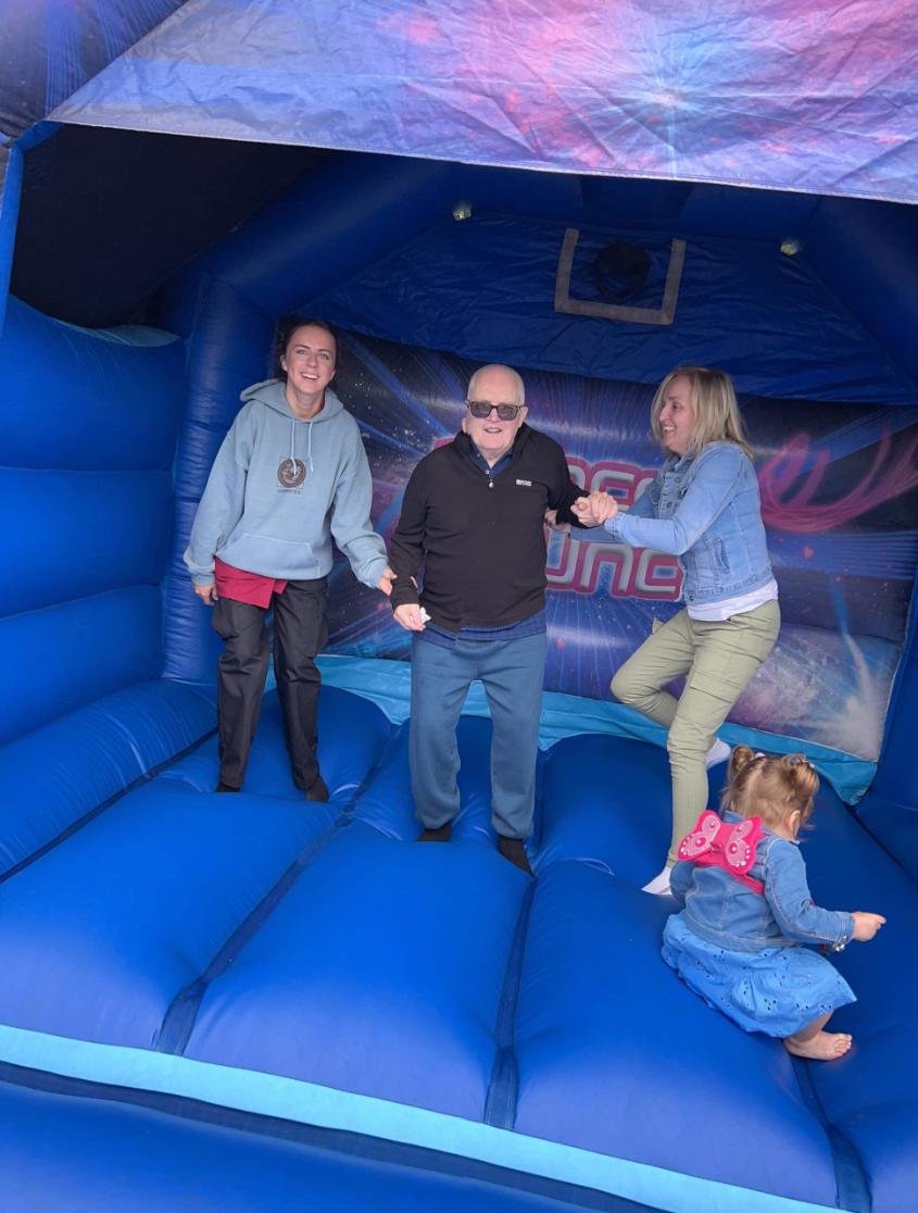 residents-and-loved-ones-on-a-bouncy-castle