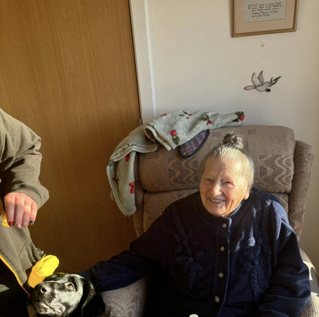 Mika the therapy dog visits Kingsacre Care Home