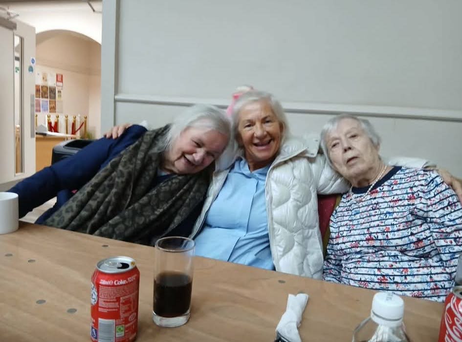 doreen and her friends smiling at the friendship club