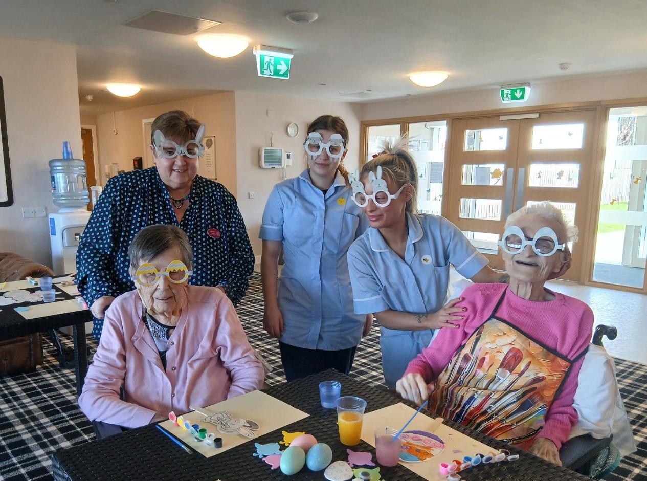 residents and staff in easter activity