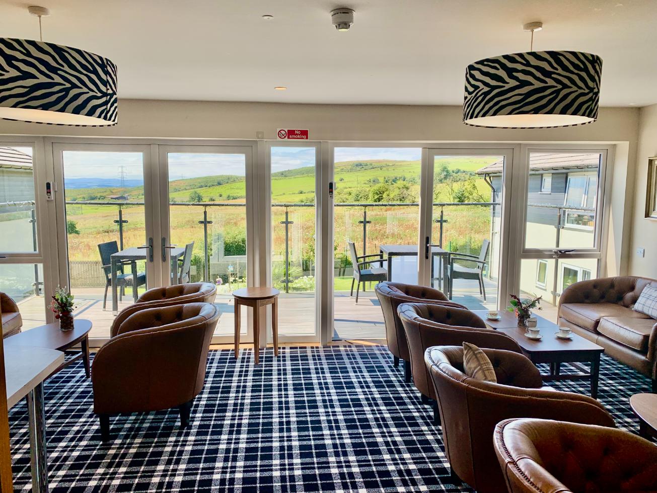 cafe area with countryside views at kingsacre care home