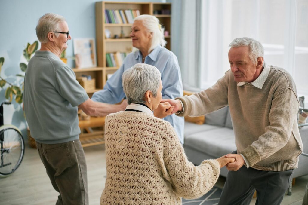 residents dancing in a care home