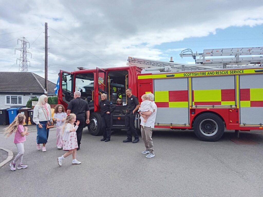 fire engine visiting care home summer fete